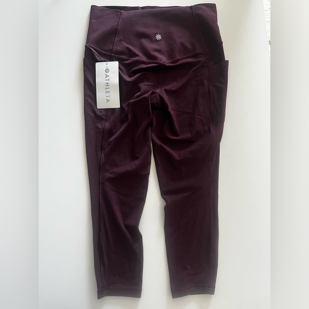 NWT Athleta SALUTATION STASH HIGH RISE 7/8 LEGGING in Spiced Cabernet—Small
